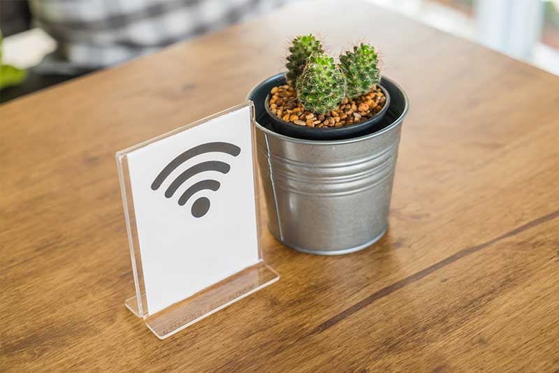 free-wifi-signal-on-table-at-hospiptality-business